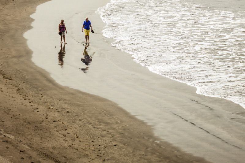 Spiegelung am Strand